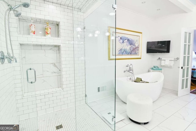 bathroom with independent shower and bath, ornamental molding, and tile patterned floors