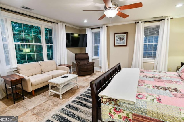 tiled bedroom with ceiling fan and crown molding