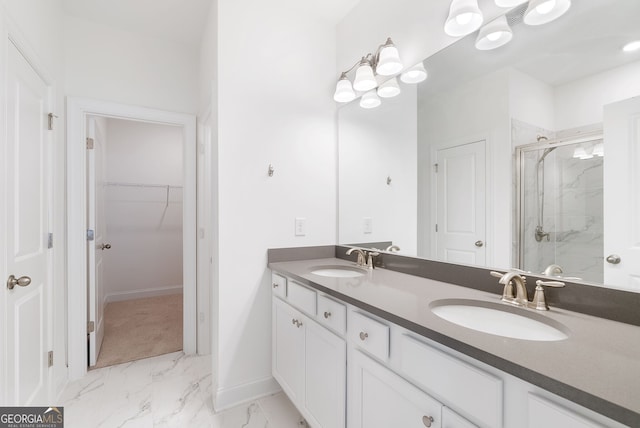 bathroom with double vanity, tile patterned flooring, and a shower with shower door