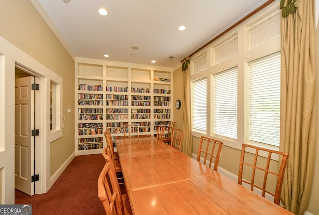 view of carpeted dining space