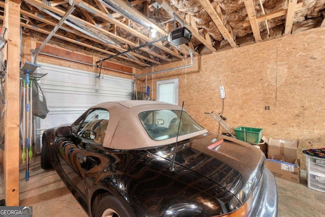 garage featuring a garage door opener