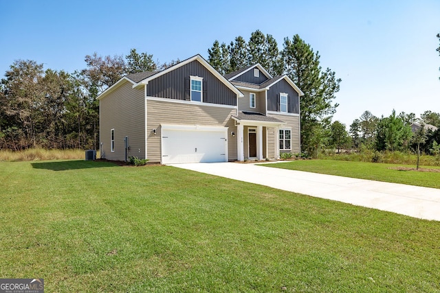 craftsman-style home featuring a front yard and a garage