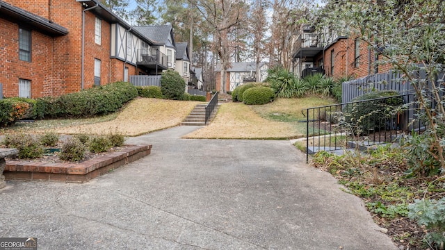 view of community featuring a yard