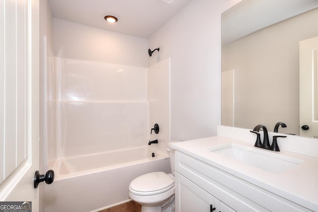 full bathroom with vanity, bathtub / shower combination, and toilet