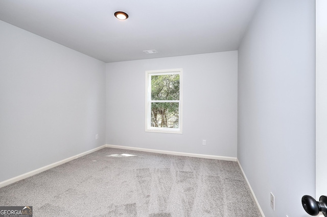 empty room featuring carpet floors