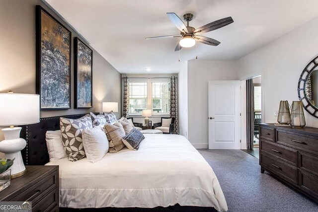 carpeted bedroom with ceiling fan