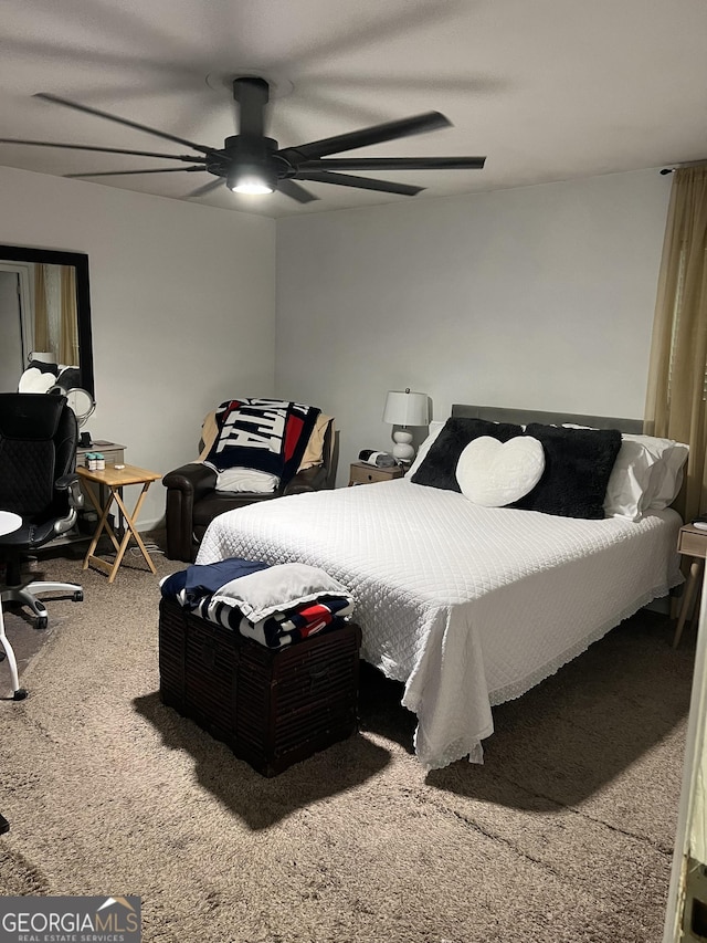 carpeted bedroom with a ceiling fan