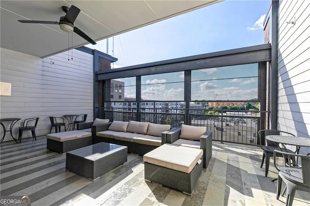 view of patio with outdoor lounge area and ceiling fan