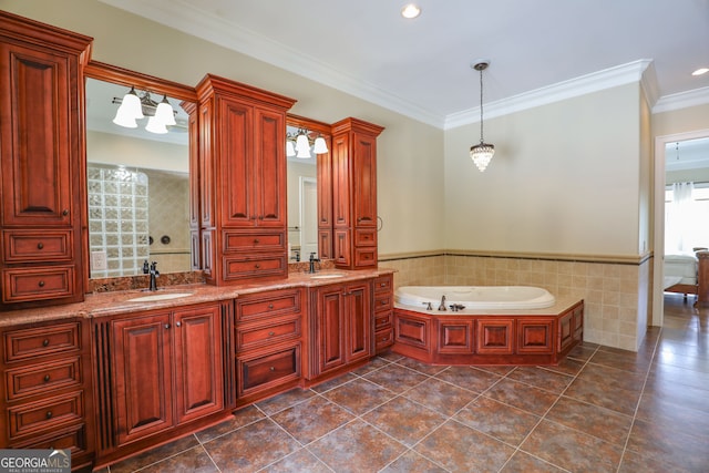 bathroom with tile patterned flooring, a tub, ornamental molding, and double sink vanity