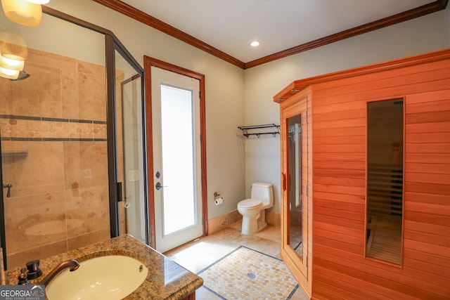 bathroom featuring an enclosed shower, tile patterned flooring, toilet, vanity, and ornamental molding