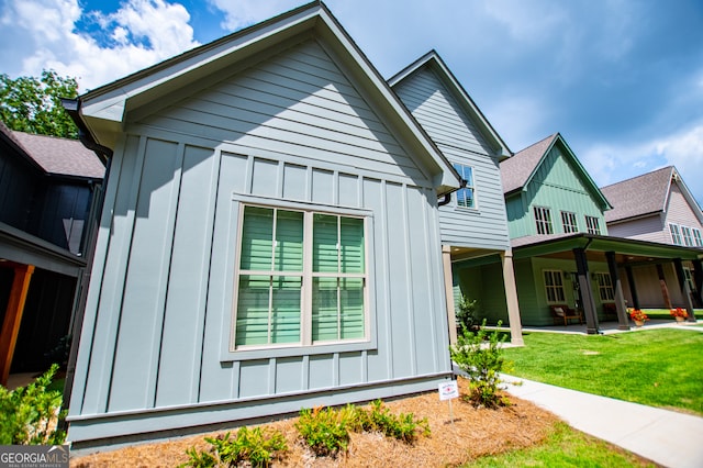 view of home's exterior featuring a yard