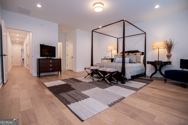 bedroom featuring light hardwood / wood-style floors