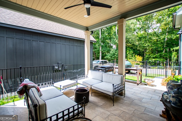 view of patio featuring an outdoor living space and ceiling fan