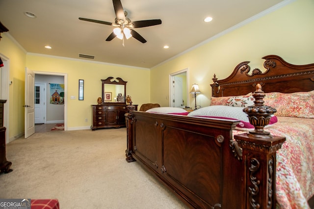 bedroom featuring ornamental molding, light colored carpet, and ceiling fan