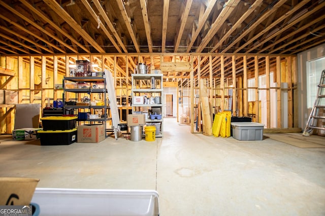 misc room with concrete flooring