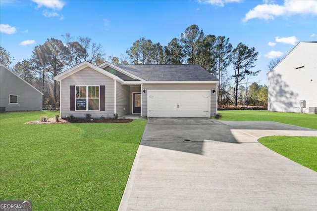 ranch-style house featuring a garage, a front lawn, and central AC unit