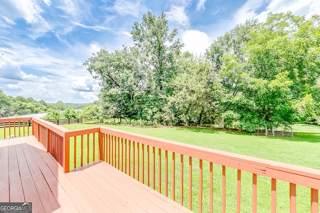 deck featuring a yard