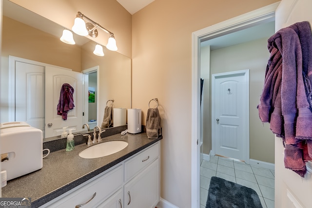 bathroom with vanity and tile patterned floors