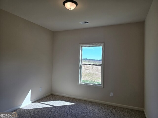 kitchen featuring ceiling fan and a center island