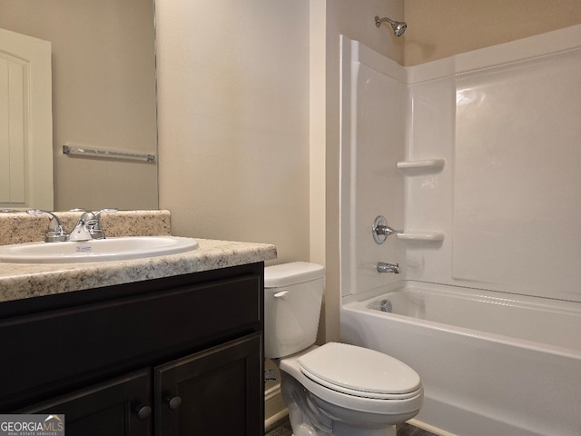 full bath featuring shower / bathing tub combination, vanity, and toilet