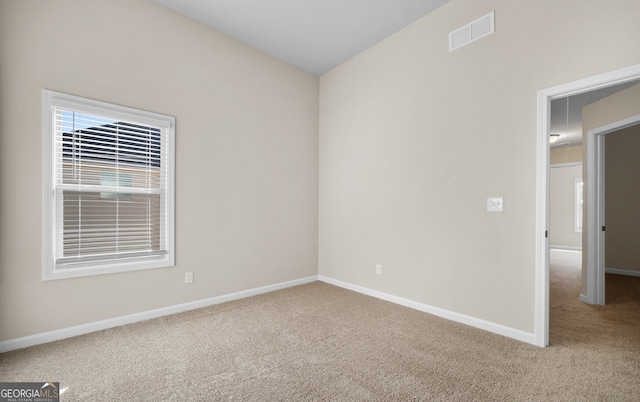 spare room with carpet flooring