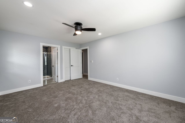 unfurnished bedroom with carpet flooring, ceiling fan, and ensuite bathroom