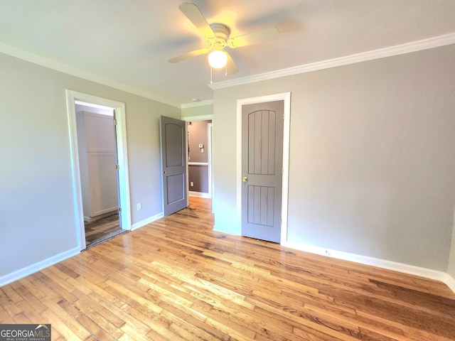 unfurnished bedroom with light wood-type flooring, ceiling fan, and ornamental molding