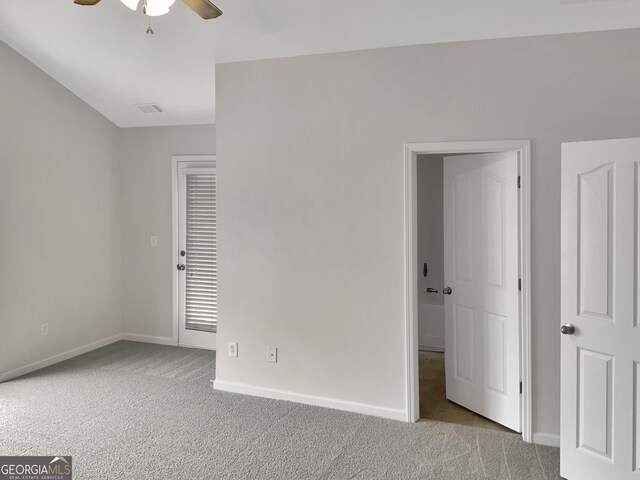 unfurnished bedroom featuring light carpet and ceiling fan