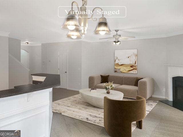 interior space with vanity and ceiling fan with notable chandelier