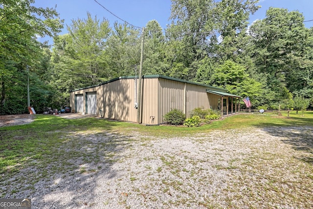 view of yard with a garage