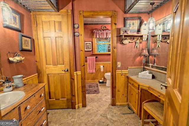 bathroom with tile patterned floors, toilet, and vanity