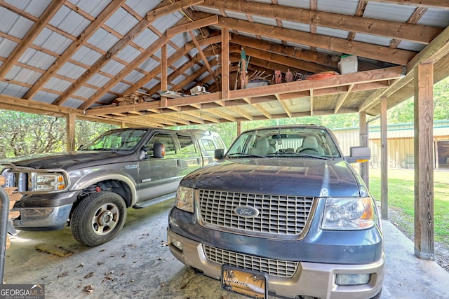 garage with a carport