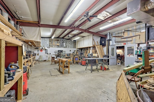 garage featuring a workshop area and ceiling fan