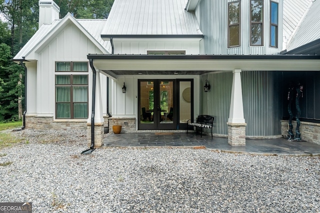 doorway to property featuring a patio