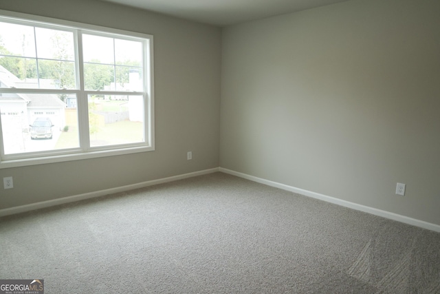 view of carpeted spare room