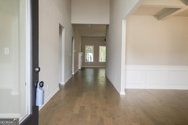 hallway featuring dark hardwood / wood-style floors