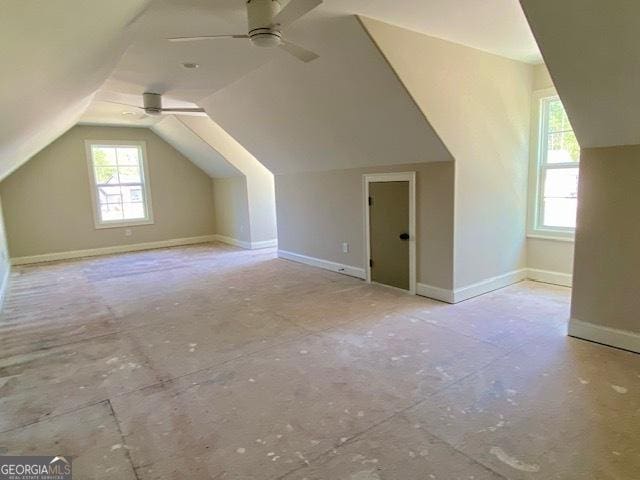 bonus room with ceiling fan and vaulted ceiling