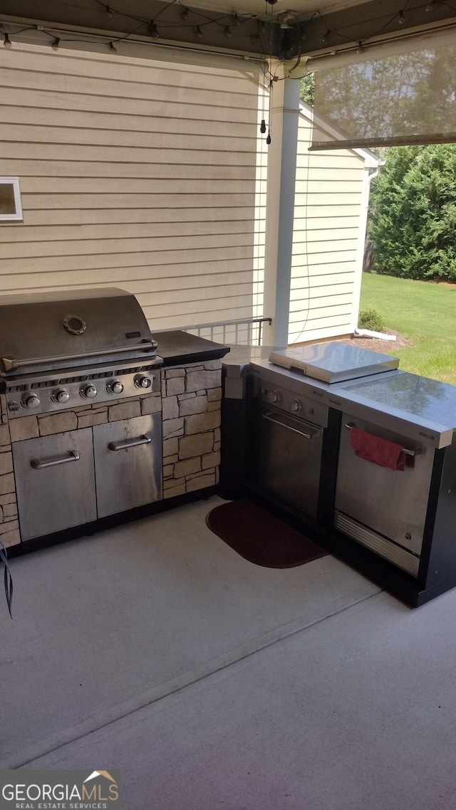 view of patio / terrace with area for grilling