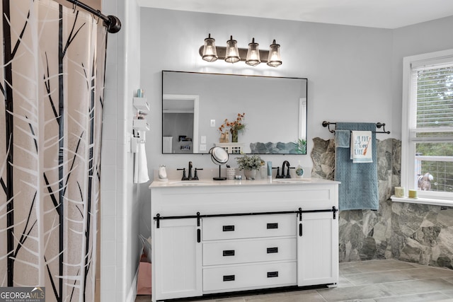 bathroom with vanity and a shower with shower curtain