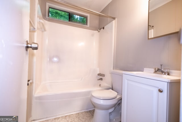 full bathroom with ornamental molding, bathtub / shower combination, vanity, tile patterned flooring, and toilet