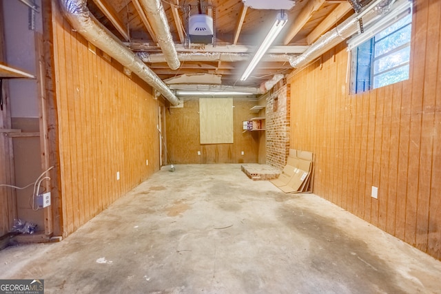 basement with wood walls