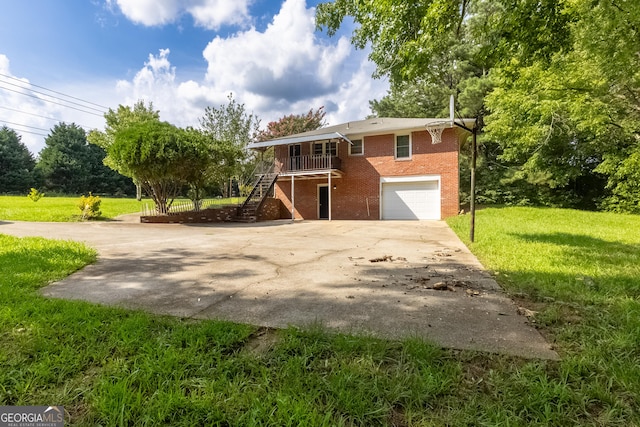 view of front property with a front yard and a garage