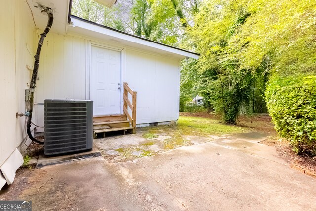 view of outbuilding with cooling unit