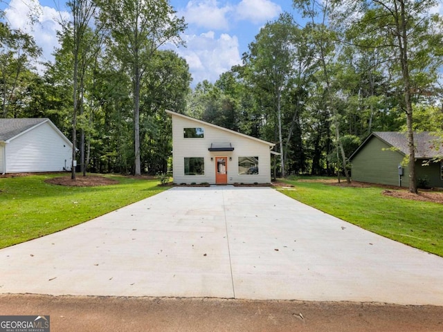 garage with a yard