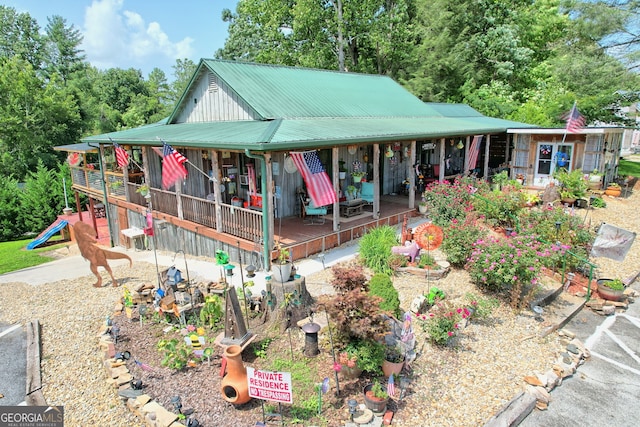 country-style home with a playground