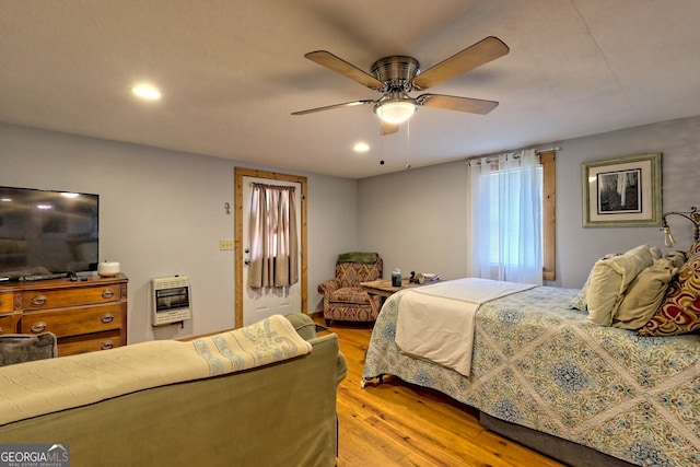 bedroom featuring ceiling fan and light hardwood / wood-style floors