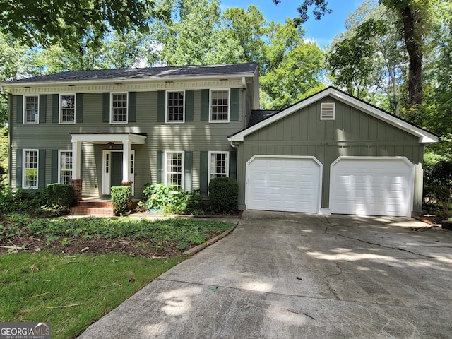 colonial-style house featuring a garage