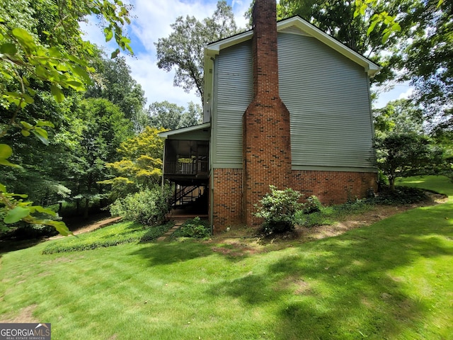 view of property exterior featuring a yard