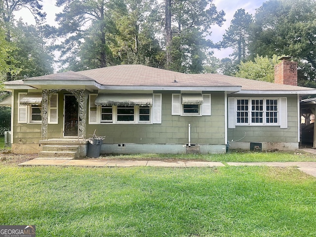 view of front of house featuring a front yard