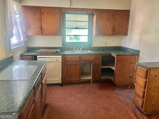 kitchen featuring sink, dishwasher, and plenty of natural light